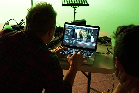 video editing in a green screen room