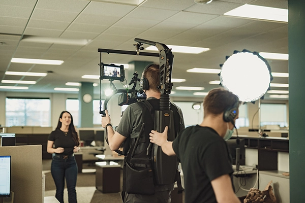 person-mounted film crane rig