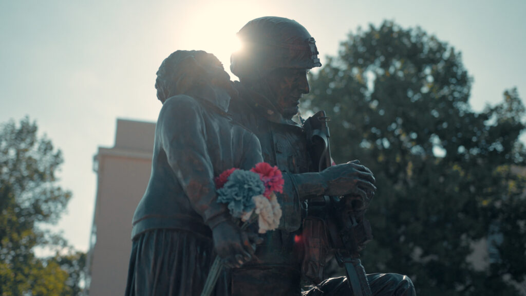 veteran statue with flowers