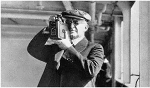 Old photo of man with camera