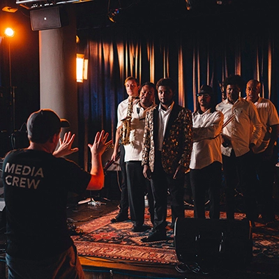 framing up a group music video shoot